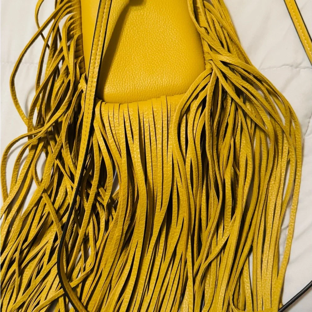 Tory Burch Mustard Yellow Fringe Crossbody bag.